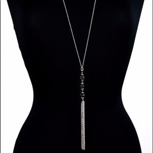 Long silver necklace with black shinny beads